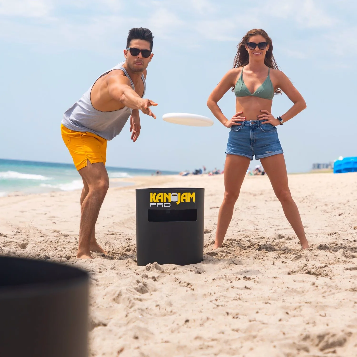 Couple playing Kan Jam with a flying disc
